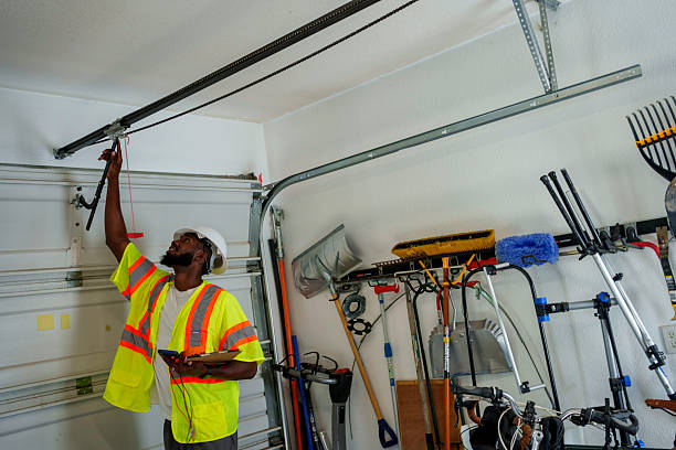 Professional Garage Door Panel Replacement technician working in Red Hill, PA